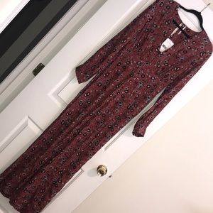 Free People Jumpsuit. New with tags,extra button still attached!